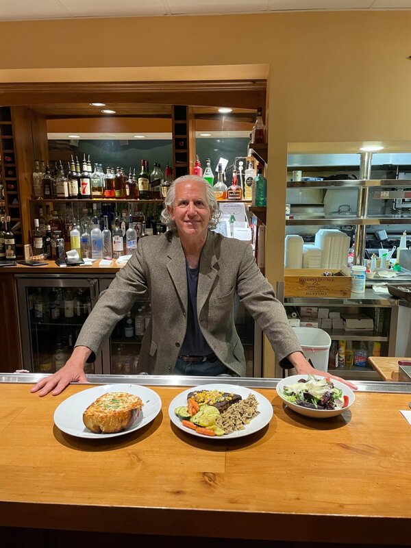 Dr. Fred Simon at his restaurant